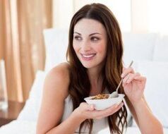 The girl ate buckwheat porridge